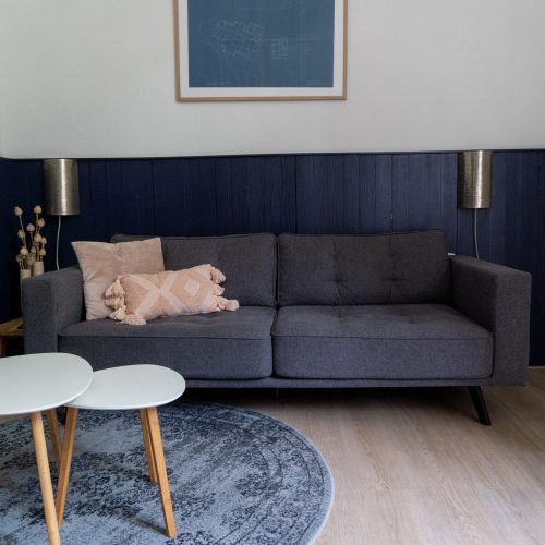 Woonkamer van vakantiewoning De Kapelaan, Vakantiewoningen De Pastorie in het Land van Maas en Waal.